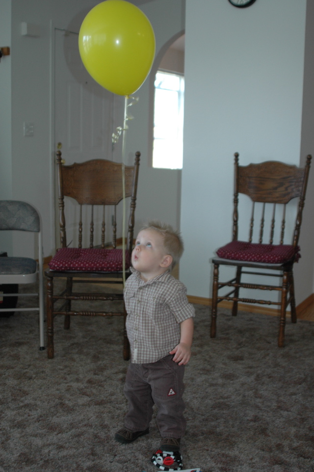 Rowan, fascinated by balloon